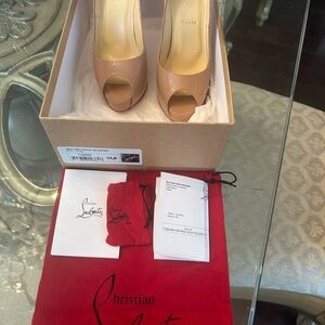 Louboutin Iconic Prive Blush Platform Peep Toe.